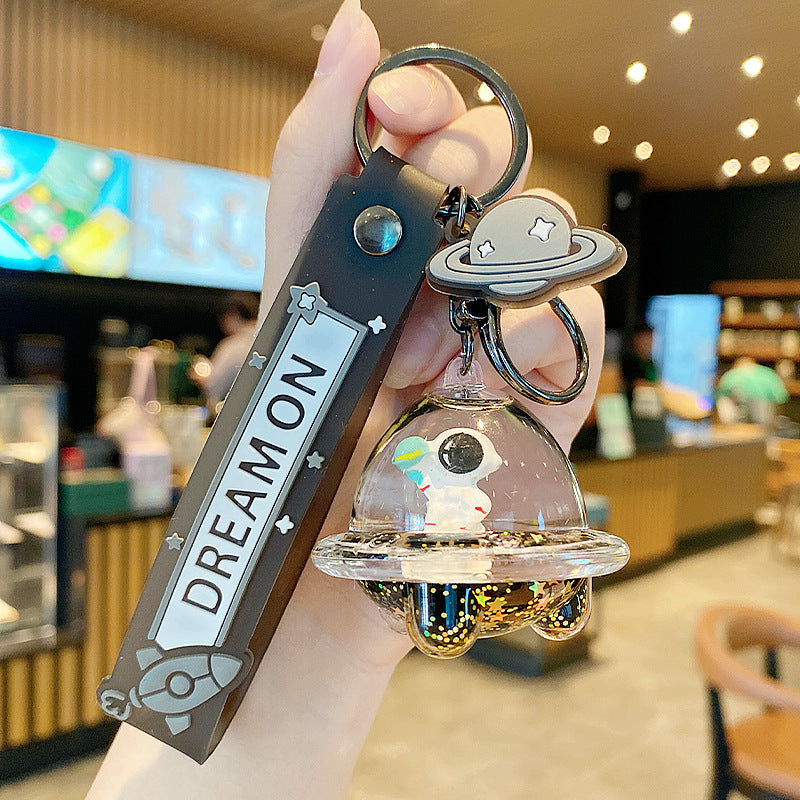 The Floating Astronaut Keychain - A Mini Universe in Your Pocket