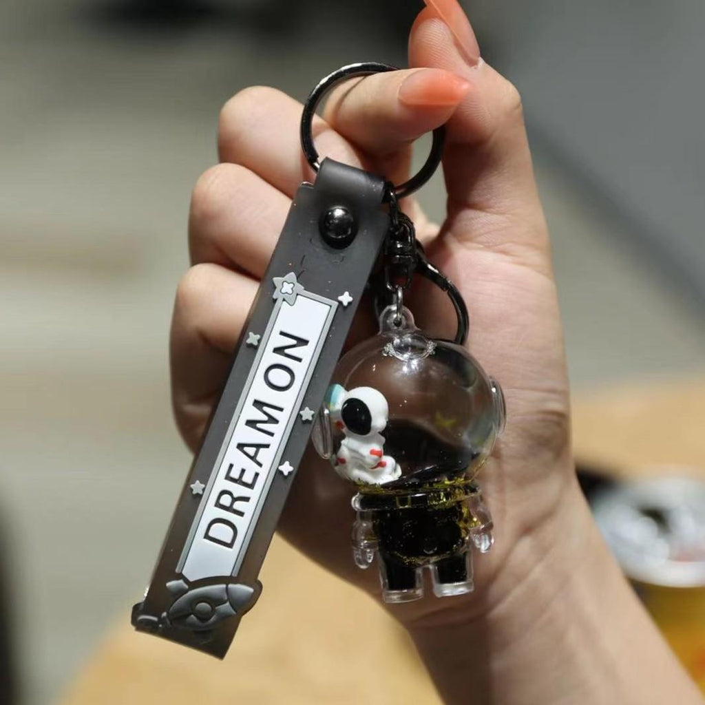 The Floating Astronaut Keychain - A Mini Universe in Your Pocket
