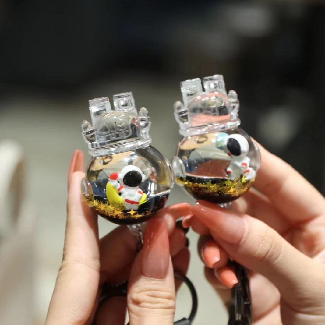 The Floating Astronaut Keychain - A Mini Universe in Your Pocket