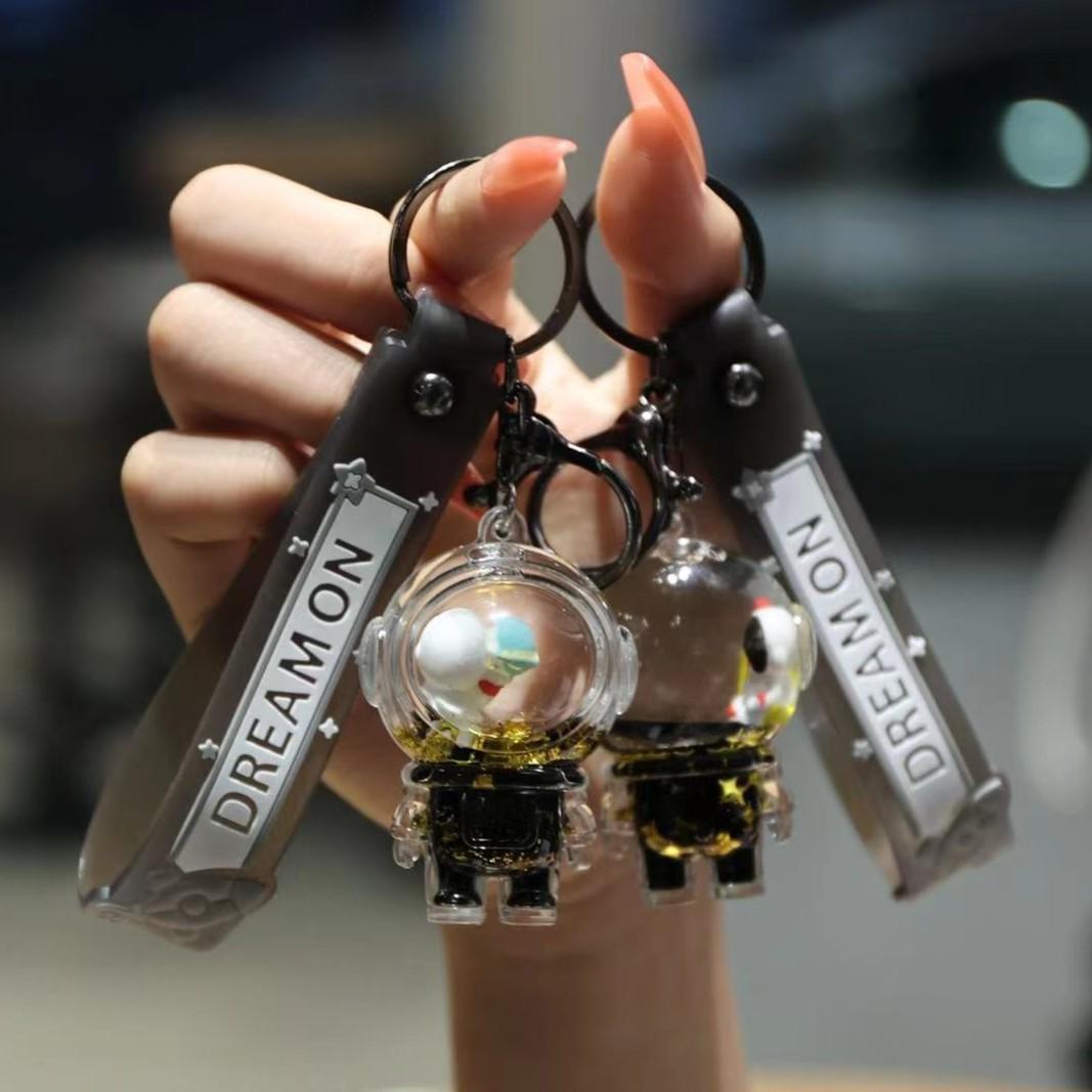 The Floating Astronaut Keychain - A Mini Universe in Your Pocket