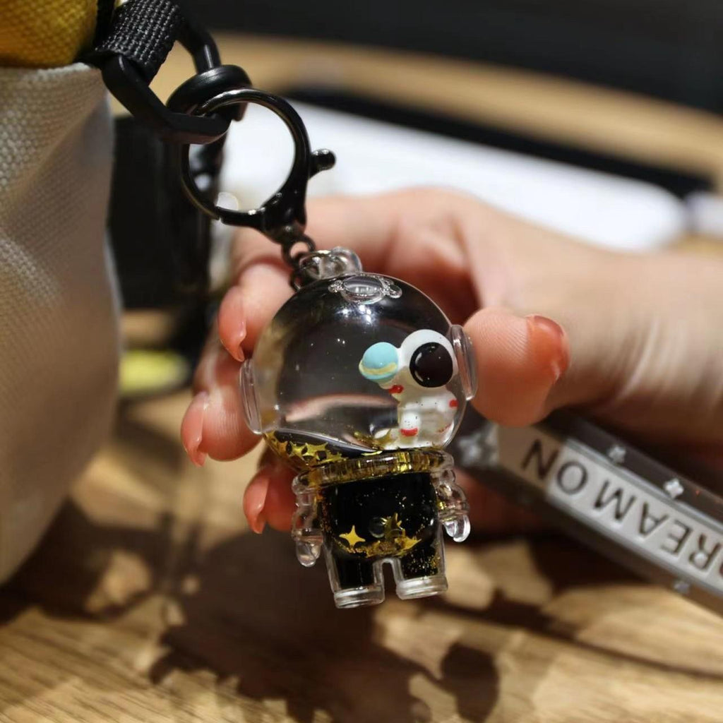 The Floating Astronaut Keychain - A Mini Universe in Your Pocket