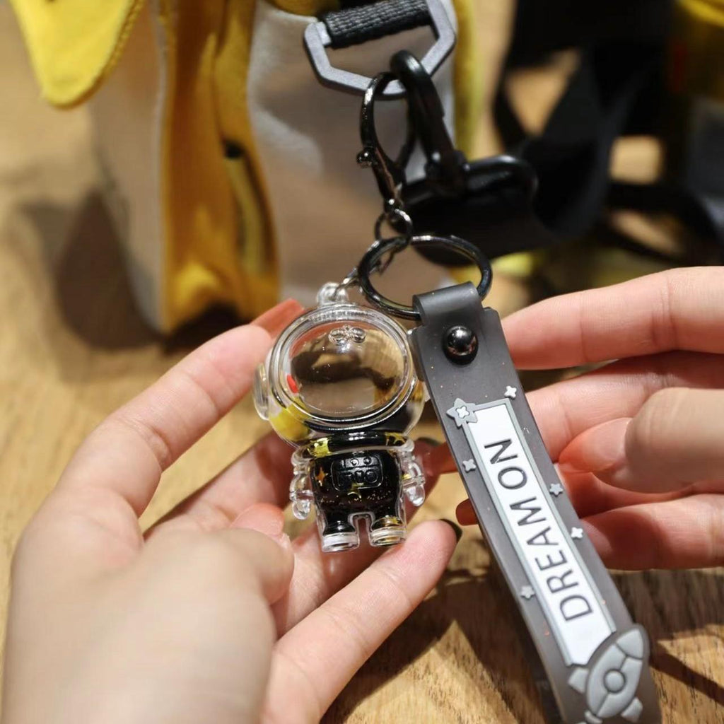 The Floating Astronaut Keychain - A Mini Universe in Your Pocket