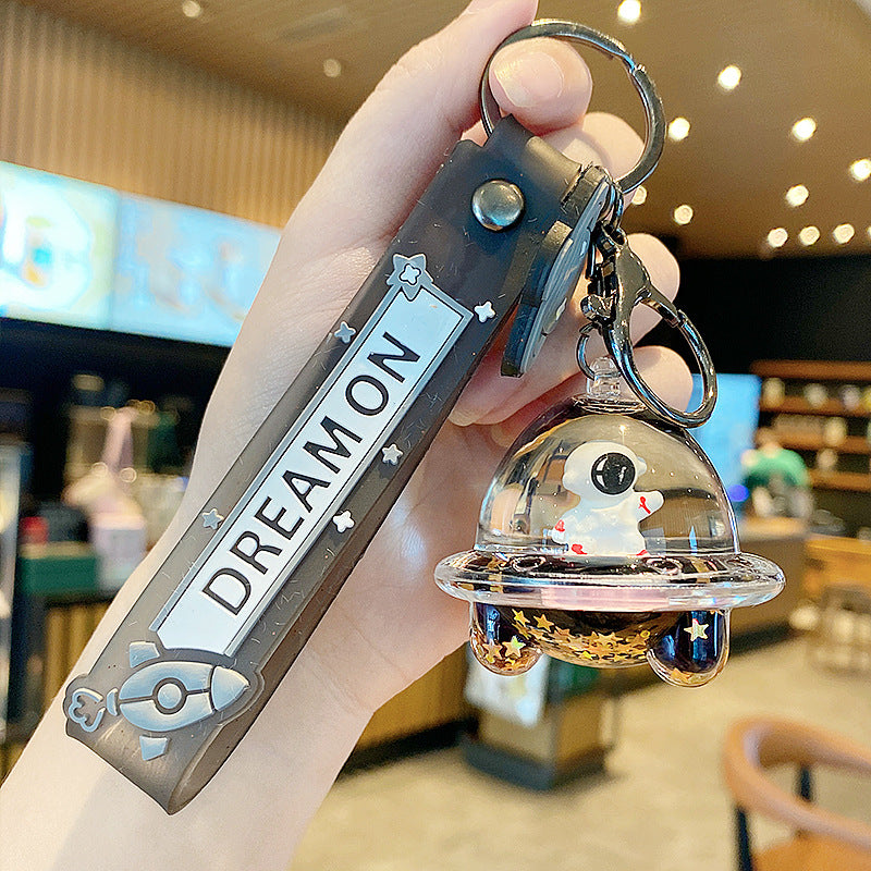 The Floating Astronaut Keychain - A Mini Universe in Your Pocket